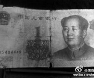沈阳菜市场现一元假币 印“中国儿童银行”